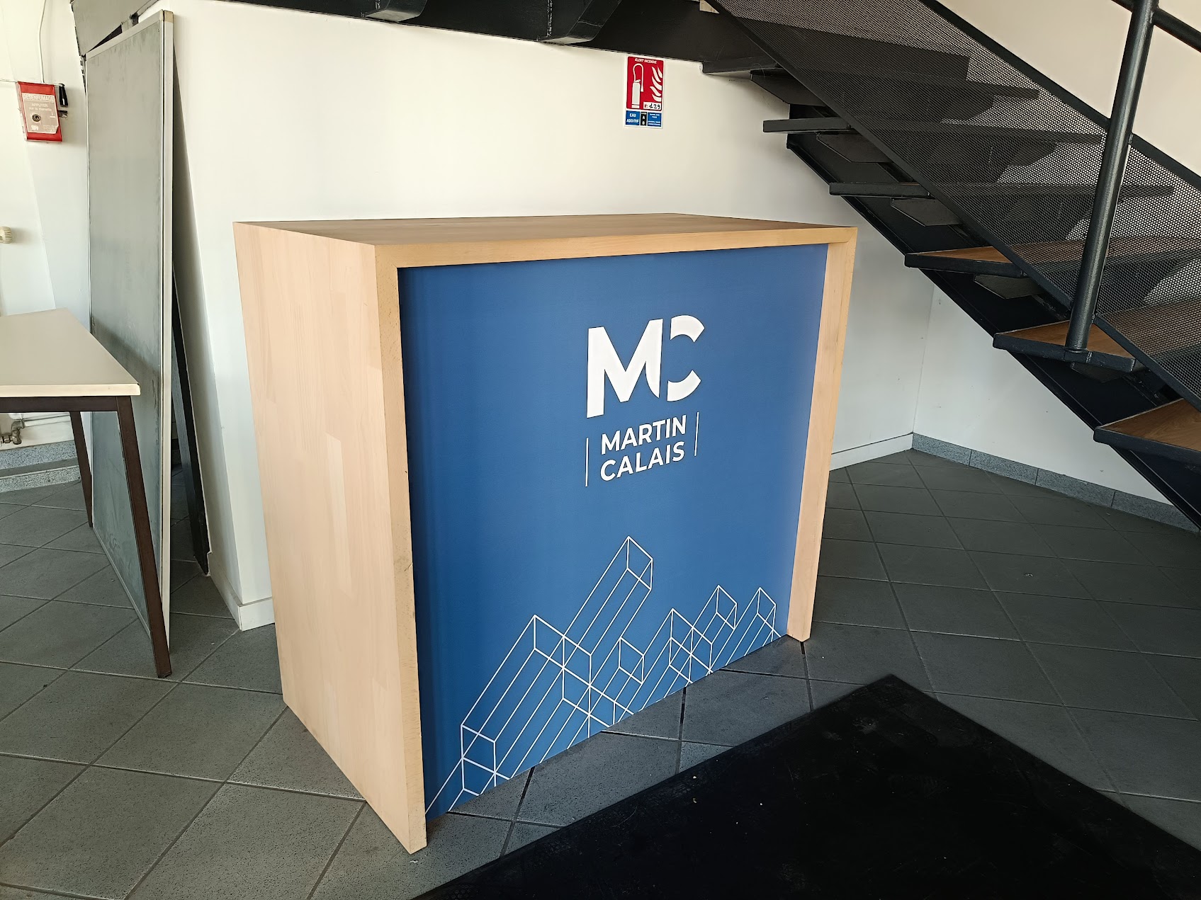 Habillage comptoir accueil Martin Calais Le Havre - adhesif grand format Peppergraphik